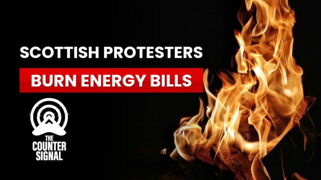 Scottish protesters burn energy bills
